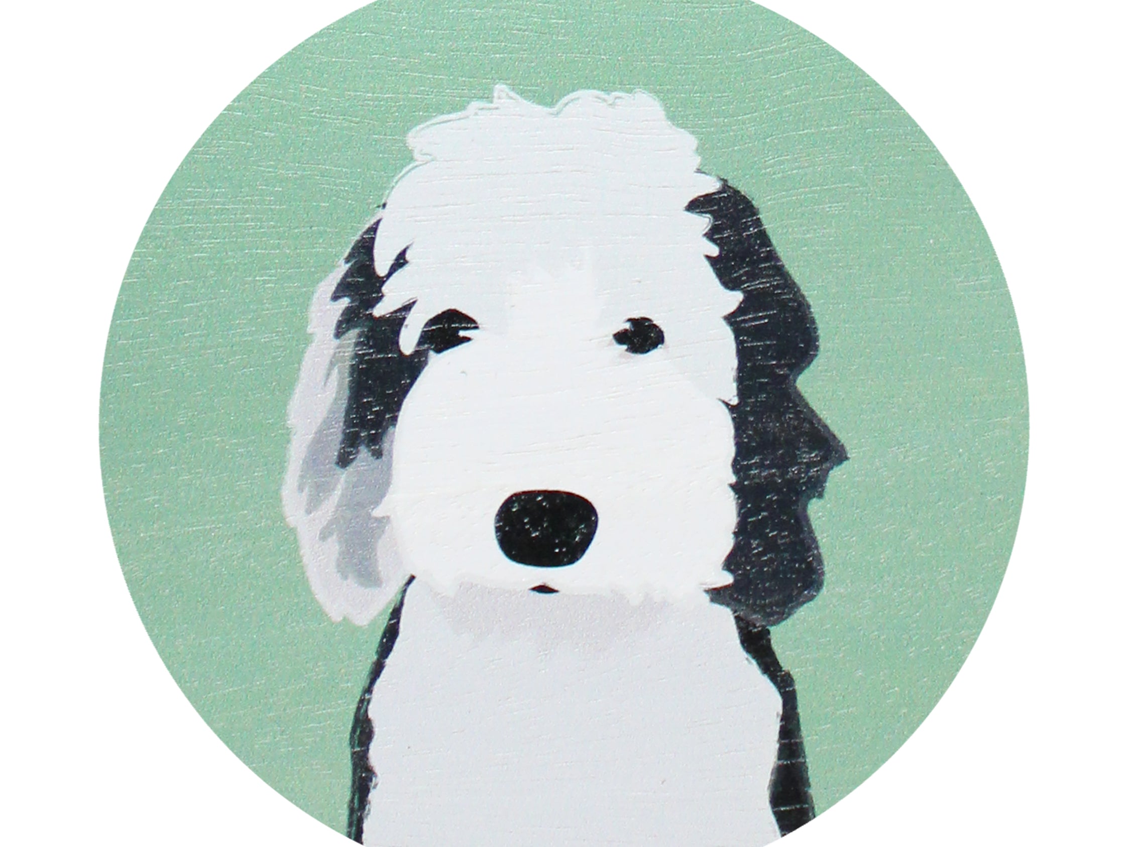 Scented candle lid with black-and-white dog face graphic