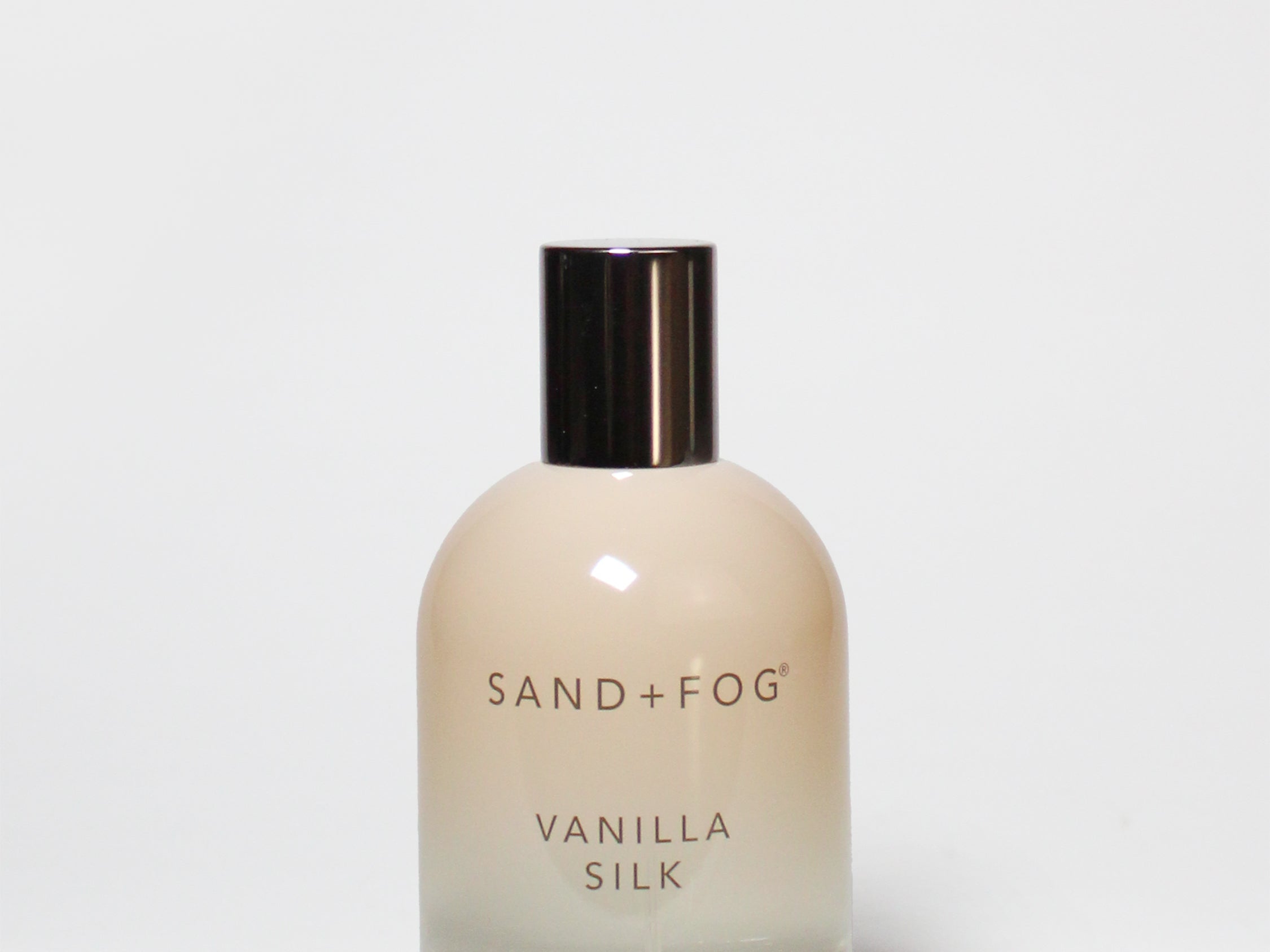 Vanilla silk eau de toilette bottle, clear glass with black cap, 100 ml