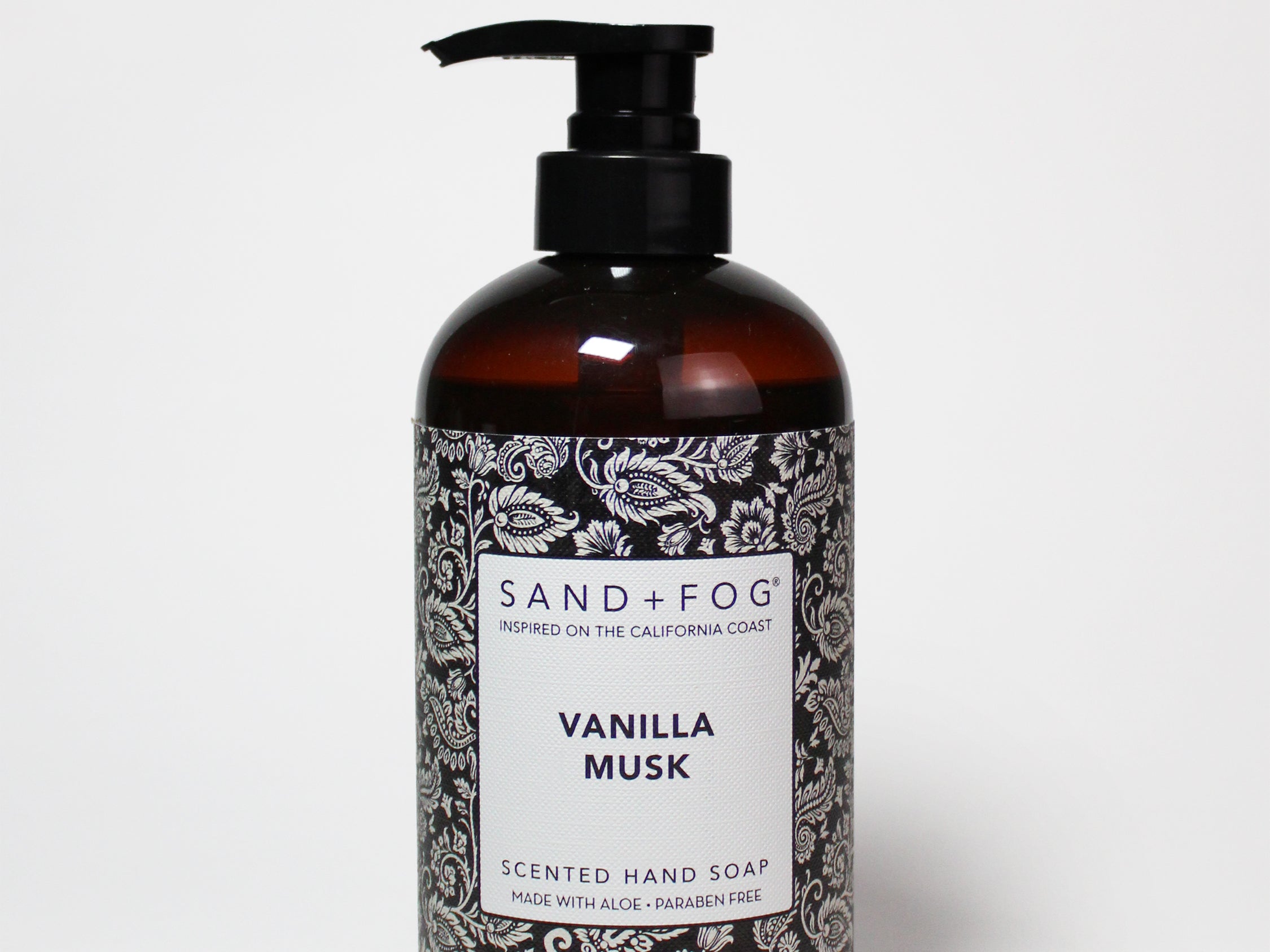 Liquid hand soap bottle with black pump, amber liquid, Vanilla Musk label