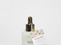 Cotton musk perfume oil bottle with gold dropper and decorative box packaging