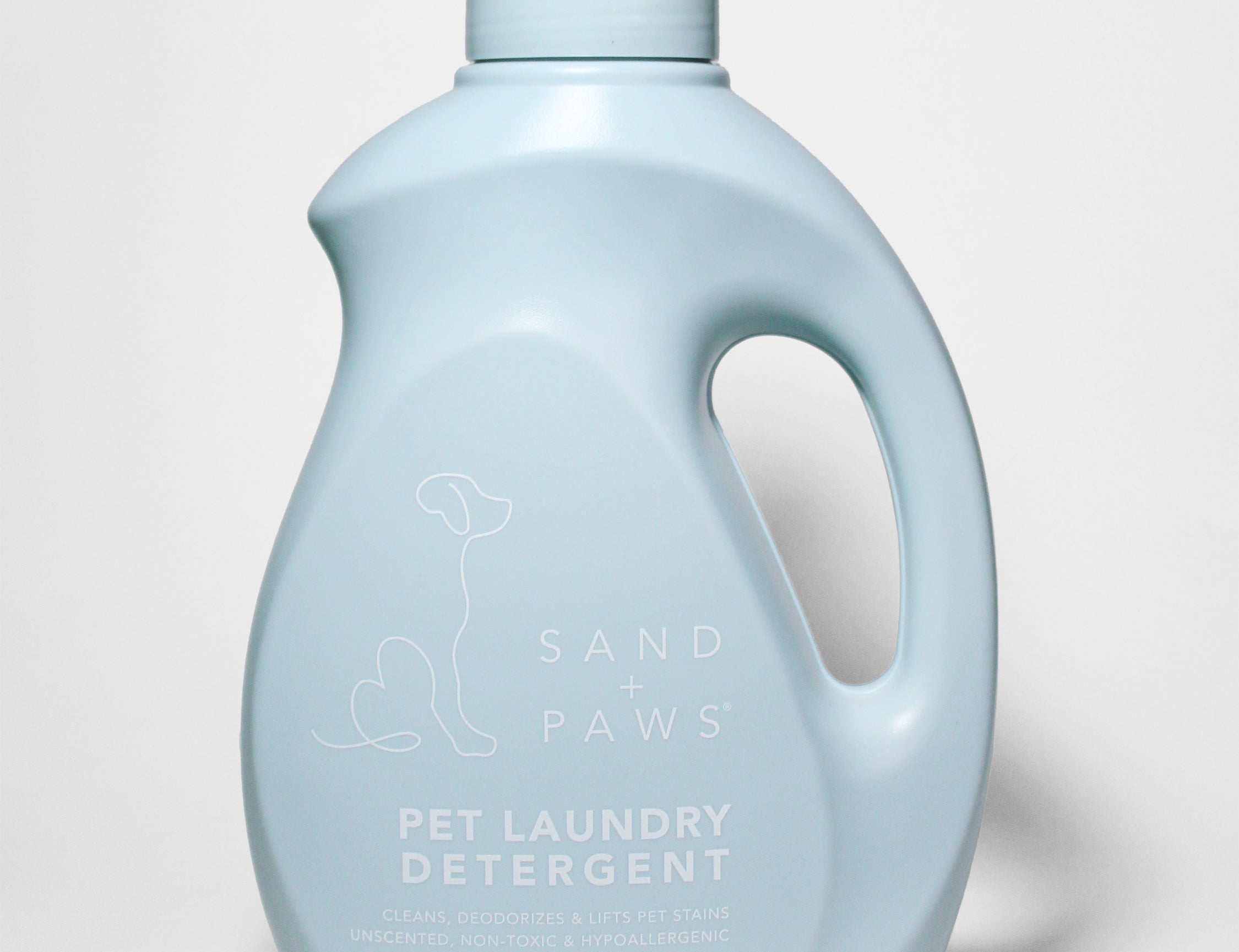 Light blue pet laundry detergent bottle with white flip-top cap