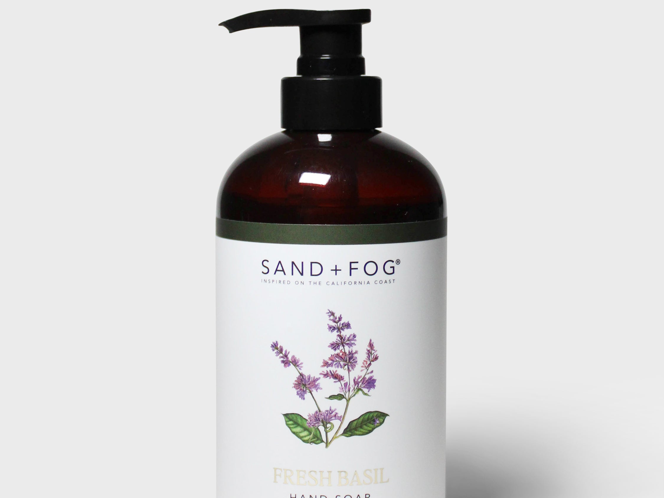 Liquid hand soap bottle with black pump; SAND+FOG Fresh Basil label and basil sprig