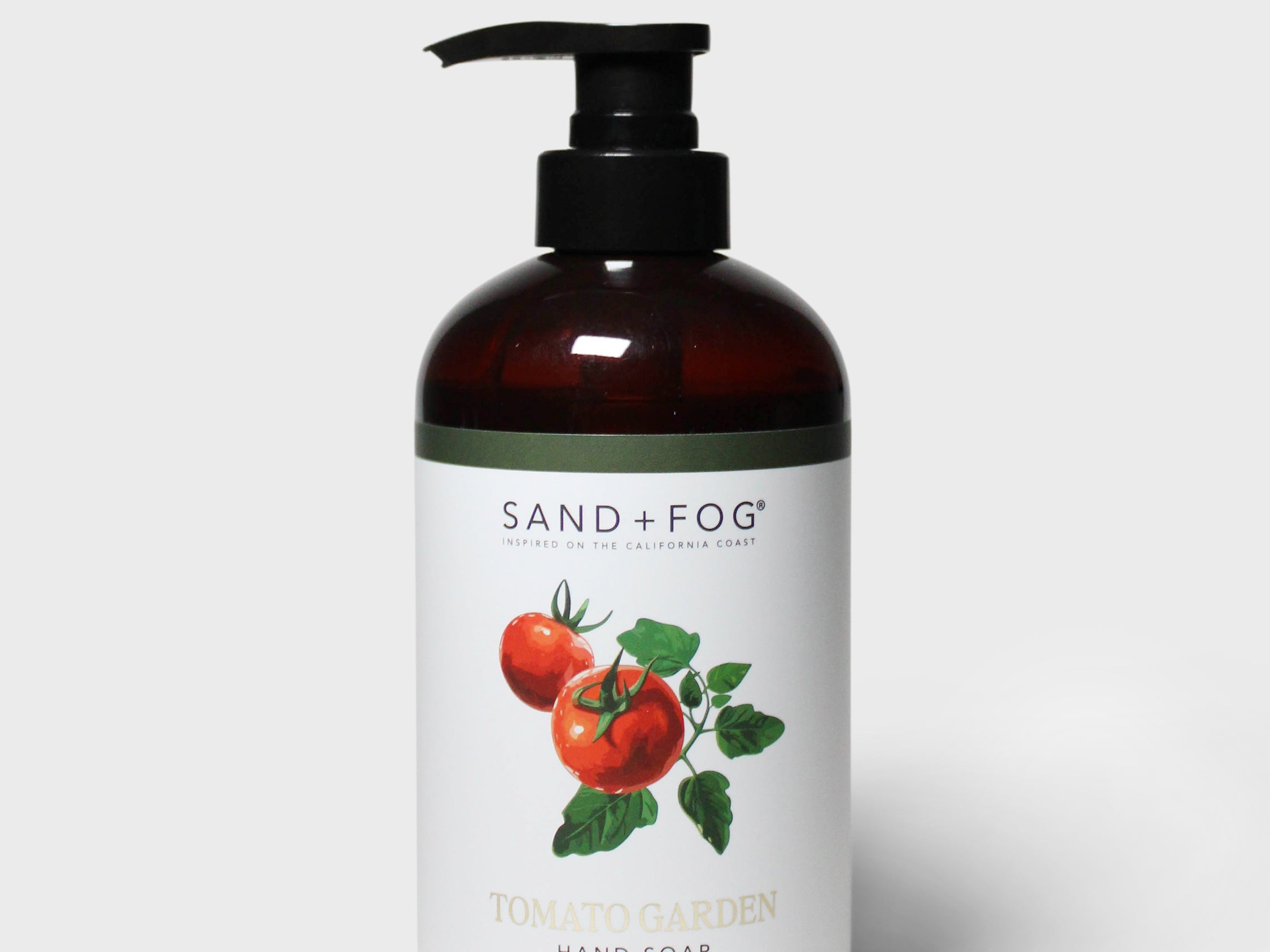 Liquid hand soap bottle with black pump; SAND+FOG Tomato Garden label and tomatoes