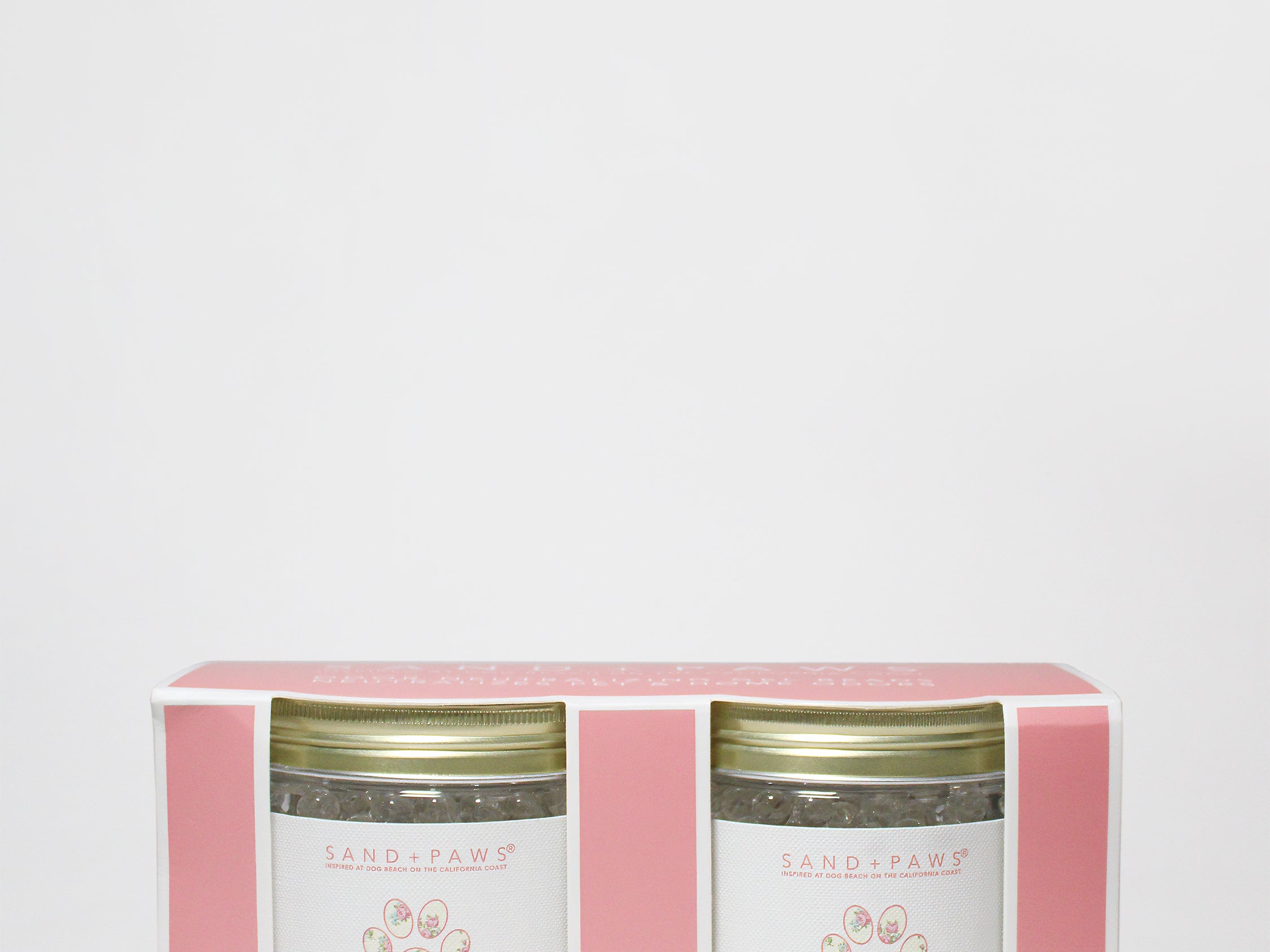 Gel scent bead pack with two tins, vanilla sandalwood scent, in pink-and-white box