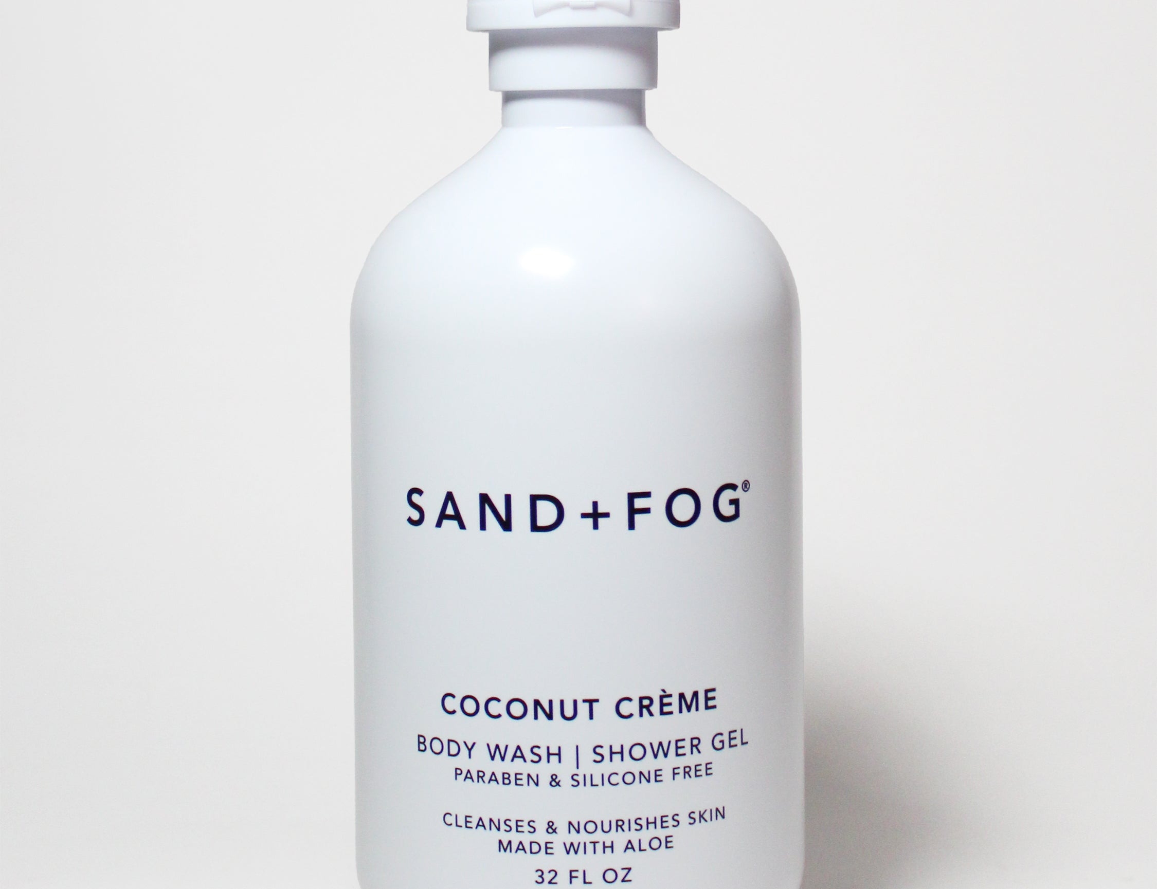 SAND+FOG Coconut Crème body wash bottle, 32 fl oz