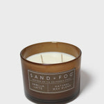 12 oz scented candle in dark brown glass jar with two white wicks