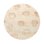 Beige wax lid with outlined coffee cup and latte icon pattern, top view of candle