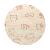 Beige wax lid with outlined coffee cup and latte icon pattern, top view of candle