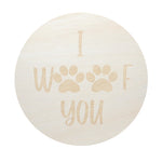 Round candle lid with “I WOOF for you” text and paw print design