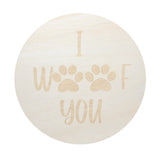 Round candle lid with “I WOOF for you” text and paw print design