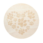 Scented candle lid with light beige paw-print pattern