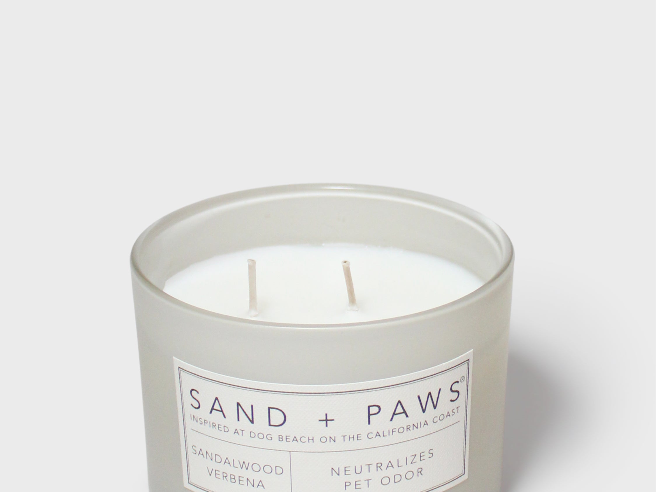 Sandalwood verbena scented candle in gray jar with double wick and label