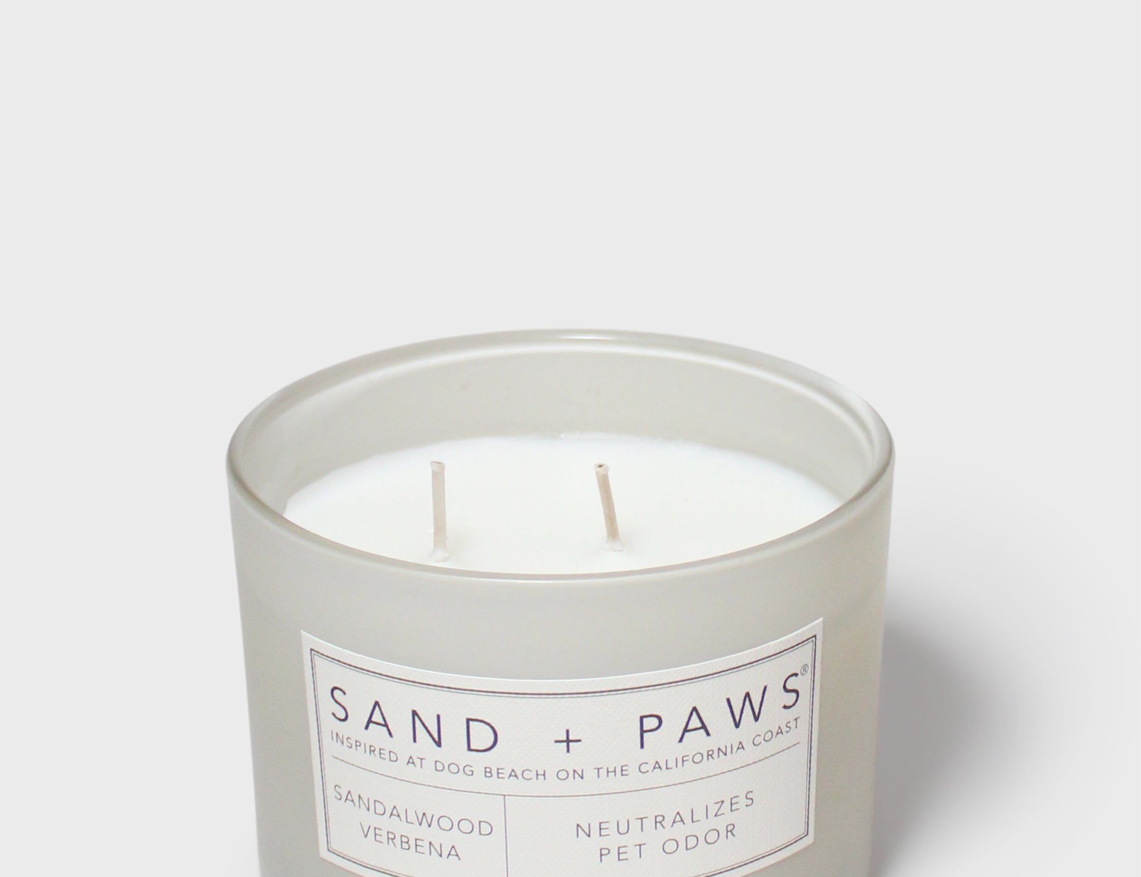 Sandalwood verbena scented candle in gray jar with double wick and label