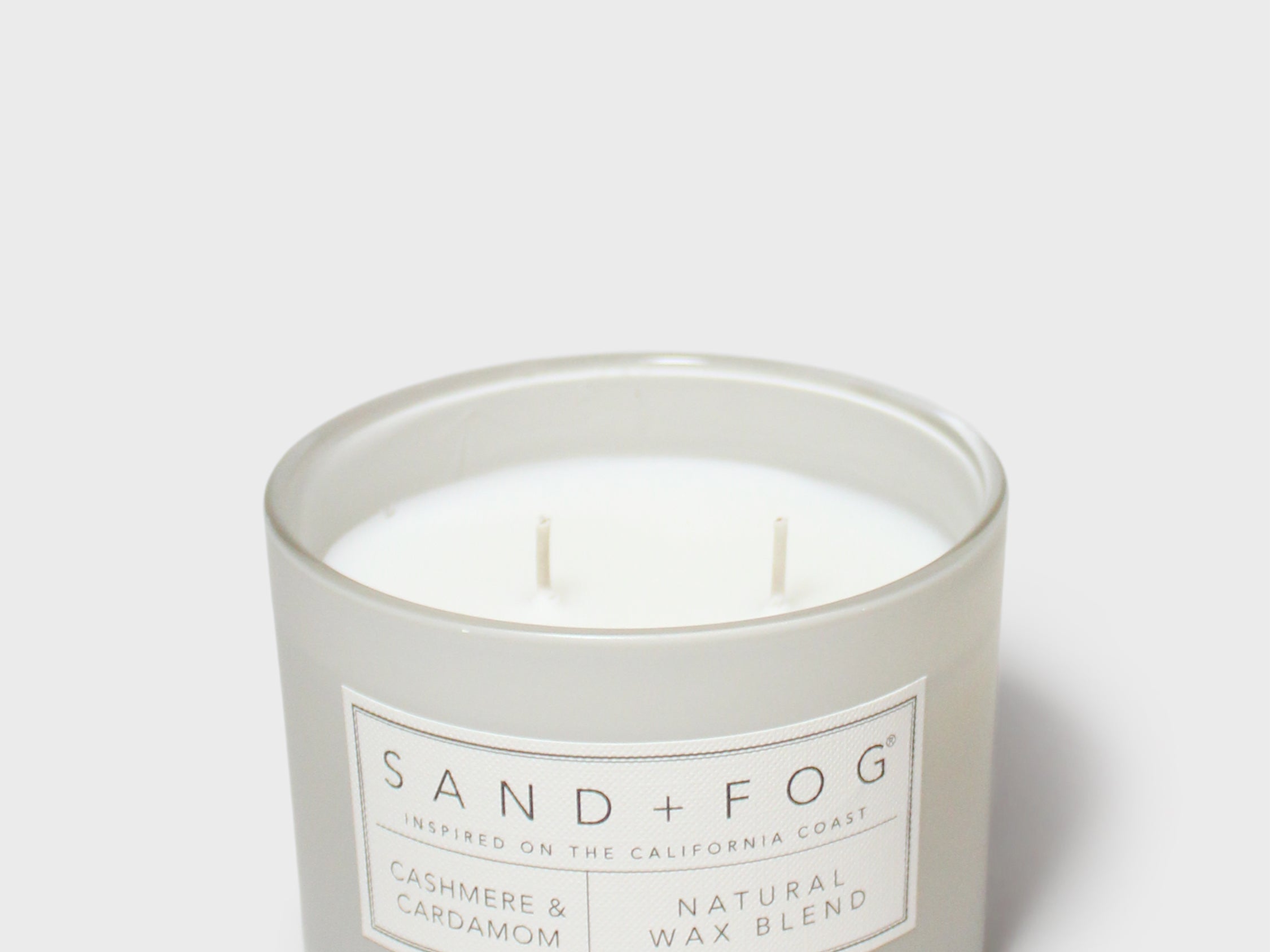SAND + FOG scented candle in glass jar with cream wax and two wicks