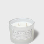 Sand + Fog scented candle jar with two wicks and Cedarwood & Rose label