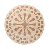 Sand + Fog scented candle lid with patterned circular design and plus symbol