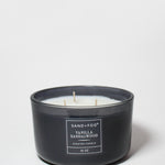 SAND+FOG vanilla sandalwood scented candle with two wicks in black jar, 16 oz