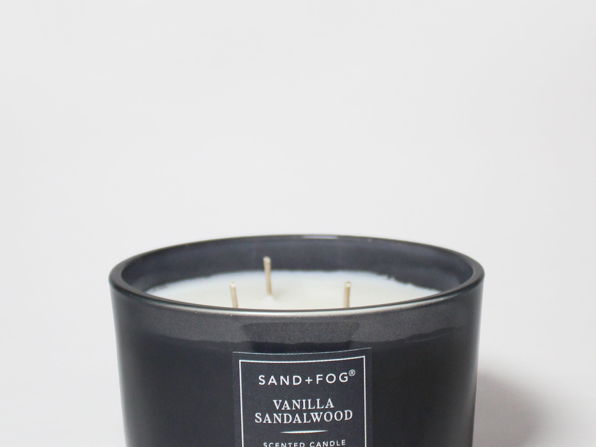 SAND+FOG vanilla sandalwood scented candle with two wicks in black jar, 16 oz