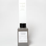 Topgana Canyon reed diffuser in a gray bottle with black cap and tall box packaging
