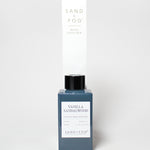 Vanilla Sandalwood reed diffuser in a blue glass bottle with matching box