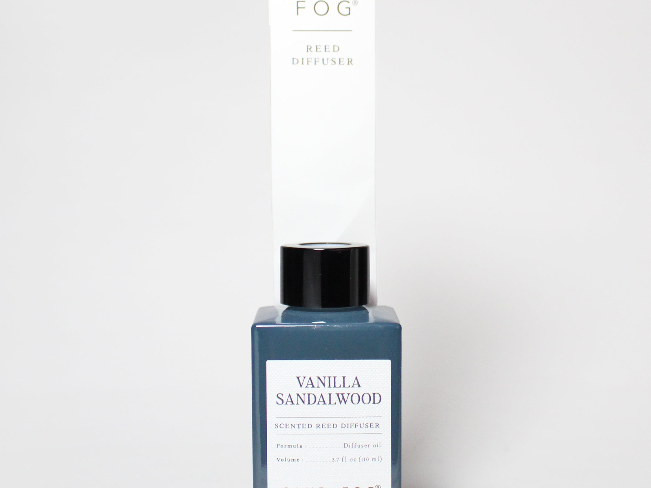 Vanilla Sandalwood reed diffuser in a blue glass bottle with matching box