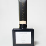 Gardenia 100 ml reed diffuser bottle with a branded box and wooden cap.