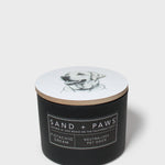 Sand + Paws 12 oz scented candle with dog sketch on lid and label
