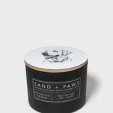 Sand + Paws 12 oz scented candle with dog sketch on lid and label