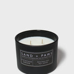 Sand + Paws 12 oz scented candle in black jar with label and three wicks
