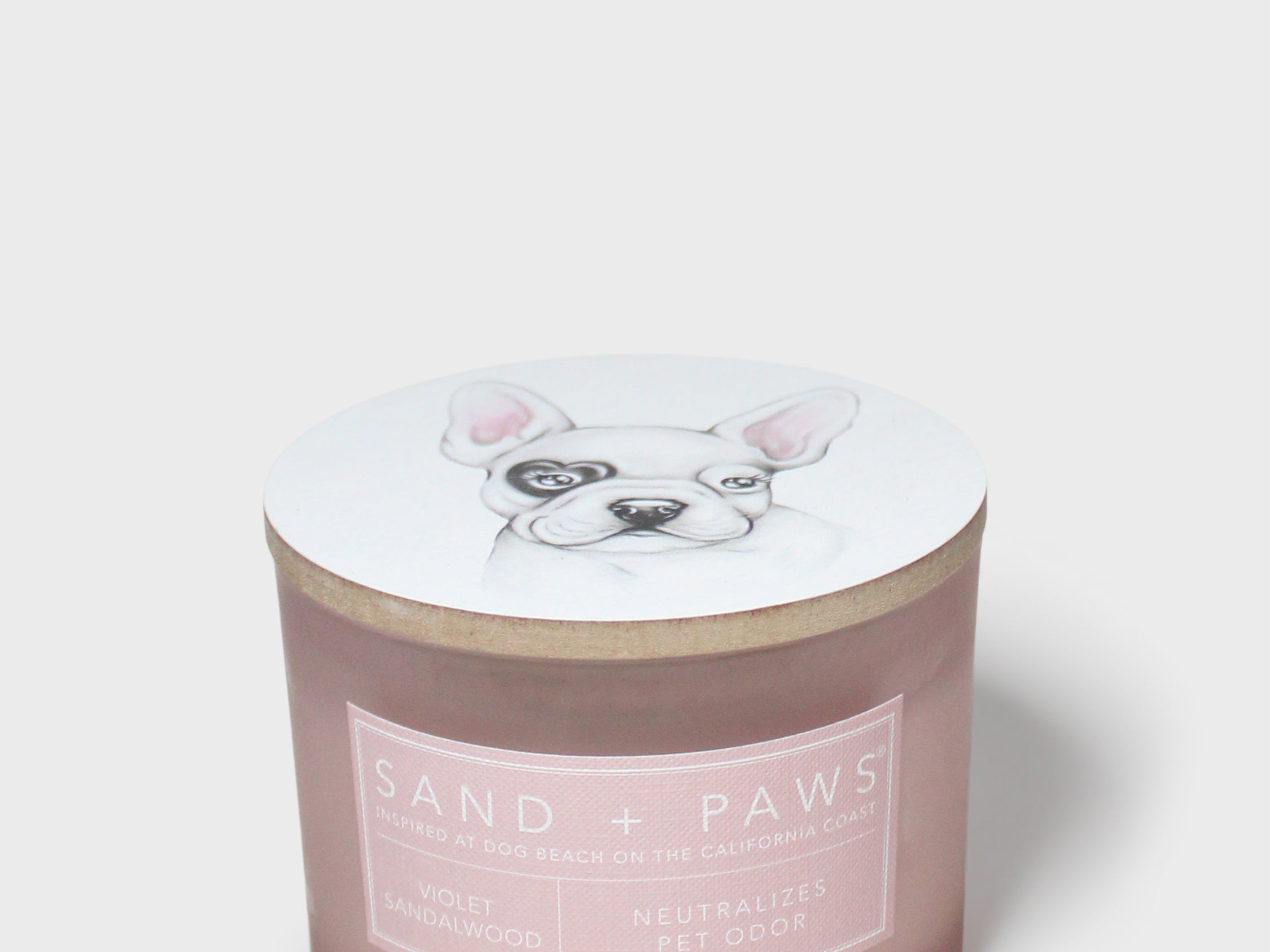 Scented candle with French bulldog lid and Sand + Paws jar label