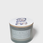 Sand + Paws Gardenia scented candle with dog-illustrated lid and front label