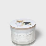 Scented candle with corgi graphic lid and Ocean Mist label