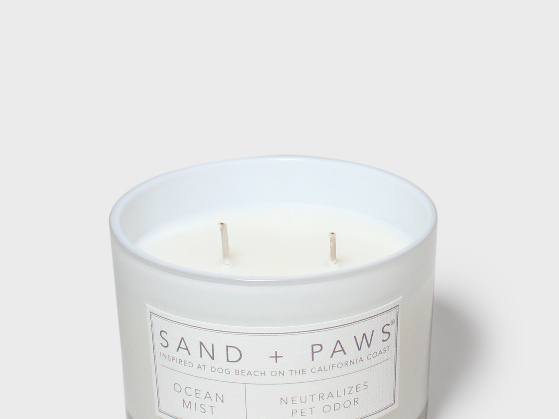 12 oz scented candle with Ocean Mist label, clear glass, two wicks