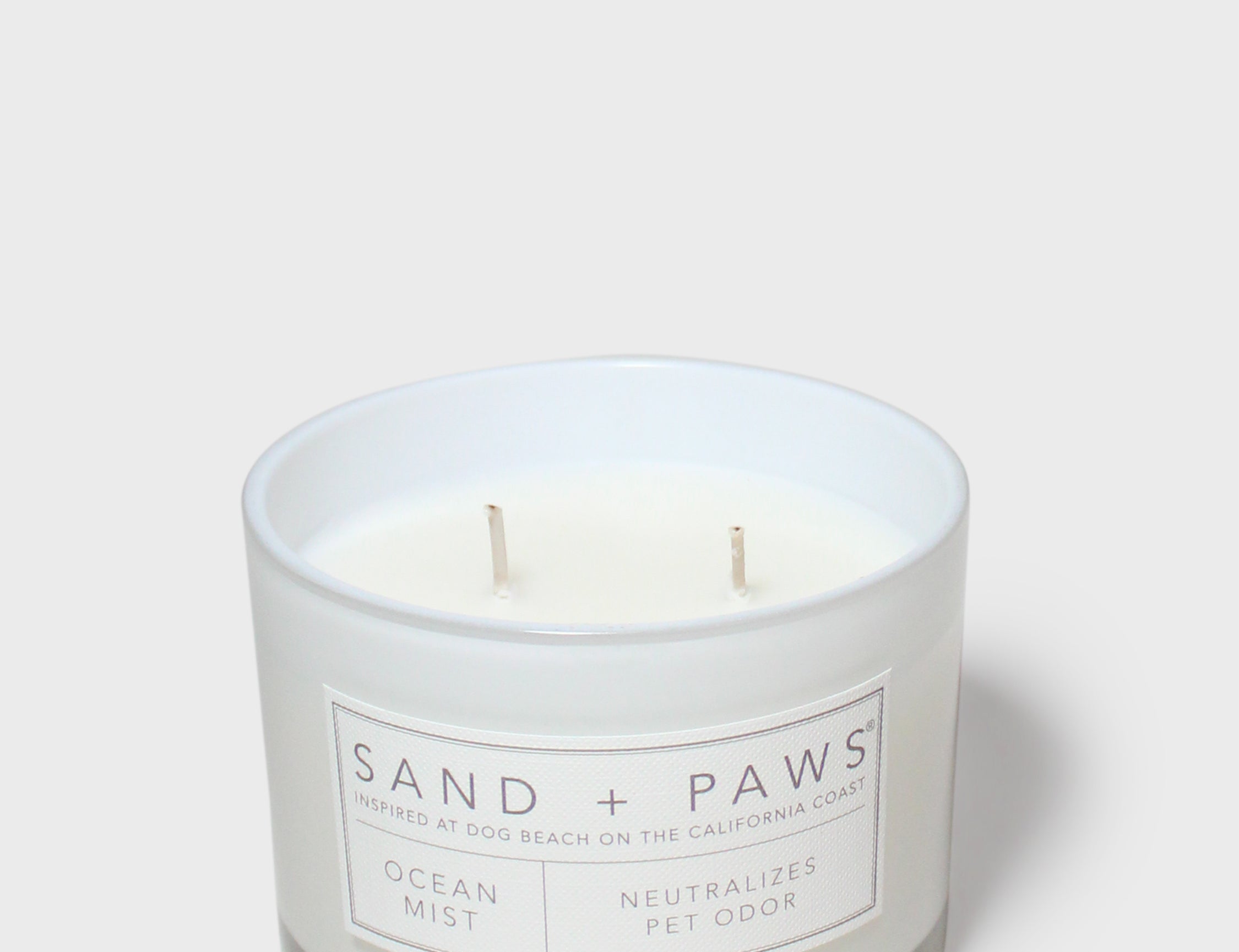 12 oz scented candle with Ocean Mist label, clear glass, two wicks