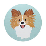 Scented candle lid with smiling dog graphic