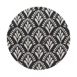 Scented candle lid with black and cream fan leaf pattern