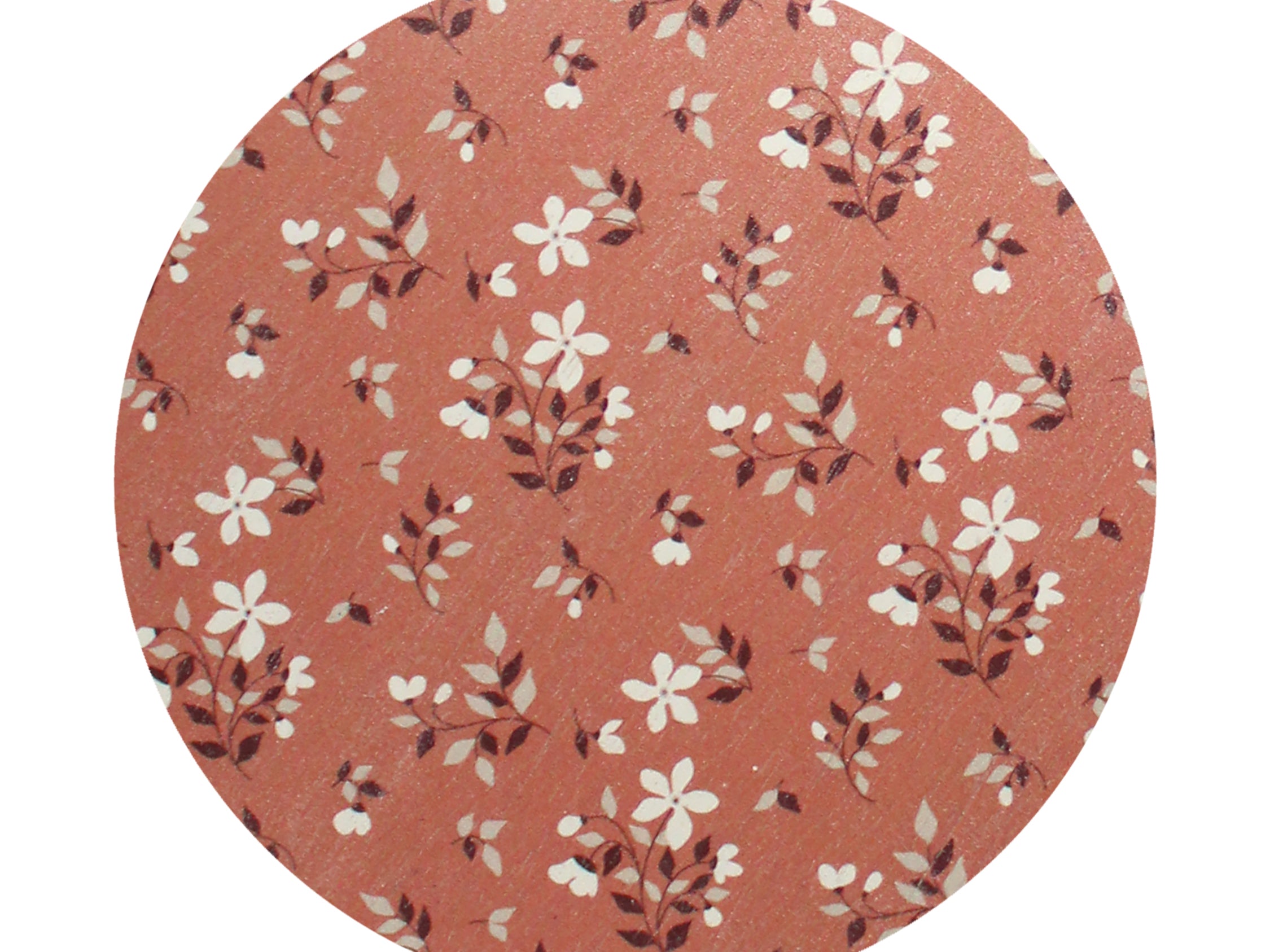 Scented candle lid with terracotta floral pattern, round wax candle top view