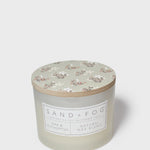 SAND + FOG scented candle jar with floral lid, natural wax blend