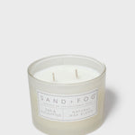 SAND + FOG scented candle jar with two wicks and label, natural wax blend