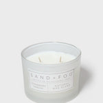12 oz scented candle in frosted glass jar with two wicks and white label