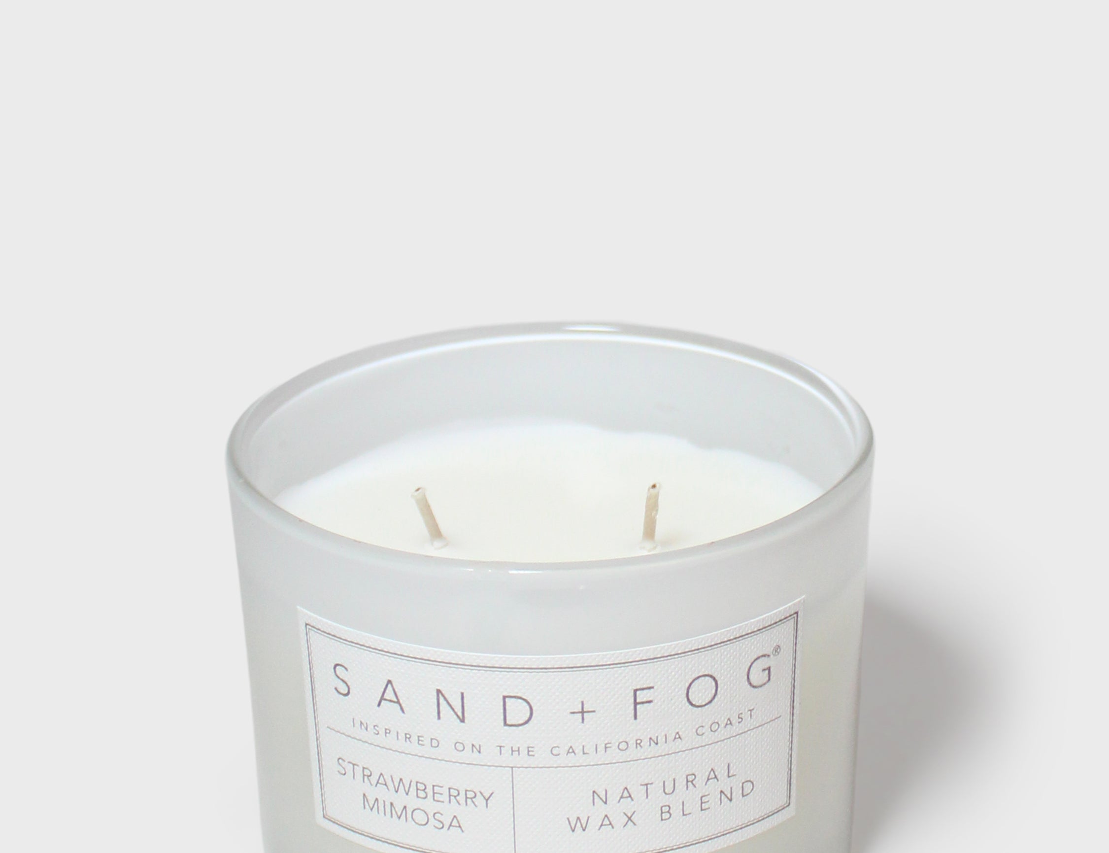 12 oz scented candle in frosted glass jar with two wicks and white label