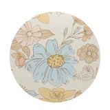 Floral illustrated scented candle lid with beige and blue flowers