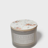 Scented candle jar with floral lid top in white with peach flower and leaf print