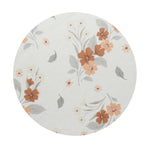 Scented candle lid, white with peach and orange floral pattern and small leaf accents