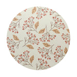 Round candle lid with botanical pattern in cream, tan, and coral; top view
