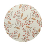 Round candle lid with botanical pattern in cream, tan, and coral; top view