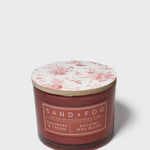 SAND + FOG scented candle in brown glass with pink floral lid