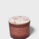 SAND + FOG scented candle in brown glass with pink floral lid