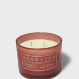 SAND + FOG scented candle with cream wax and brown glass jar