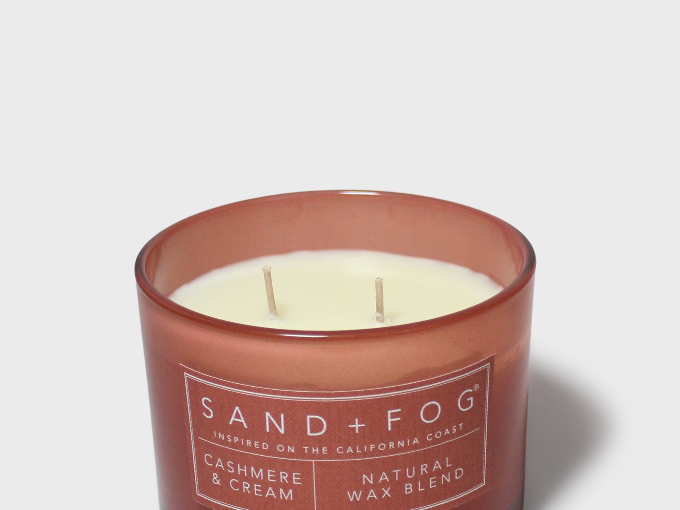 SAND + FOG scented candle with cream wax and brown glass jar